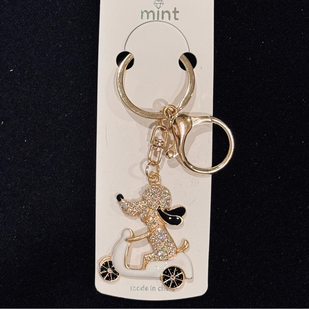 BAG CHARM Mint Gold and White Dog On Scooter Keychain - Picture 1 of 10